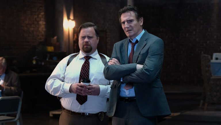 Naked Gun Reboot Writers on Controversial Jokes: O.J., R-Word, Sequel Paul Walter Hauser plays Ed Hocken Jr. and Liam Neeson plays Frank Drebin Jr. in The Naked Gun from Paramount Pictures.