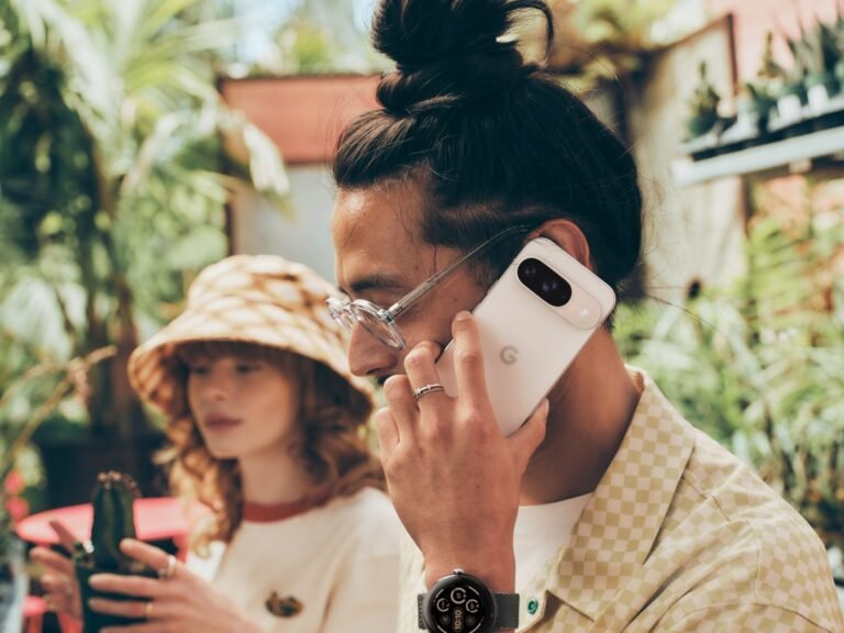 man with cell phone to ear