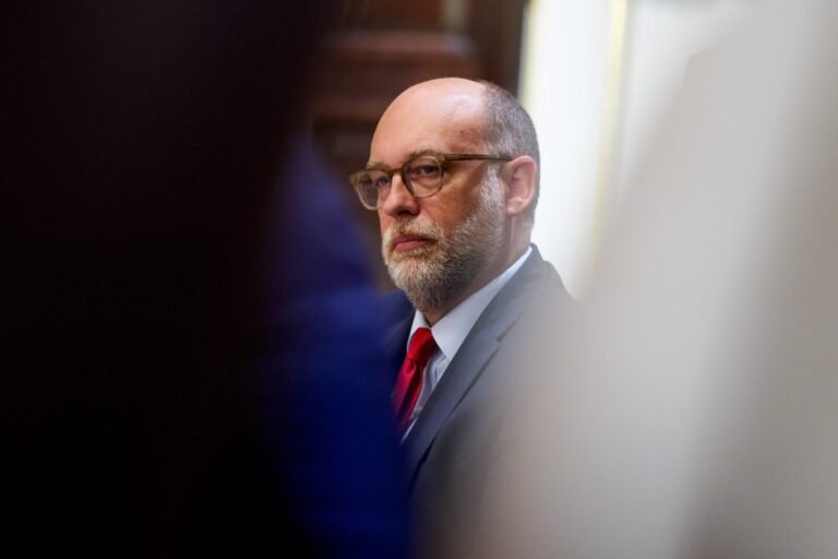 Russell Vought, director of the Office of Management and Budget (OMB), sits in a cabinet meeting.