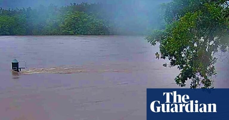 Far north Queensland residents told to seek higher ground as tropical low heads for coast | Australia weather